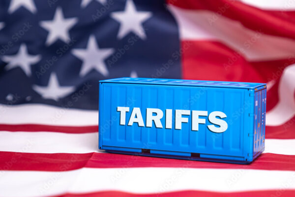 Container tariffs word on Flag of the United States of America background.
Tariff US trade war with Canada and Mexico.