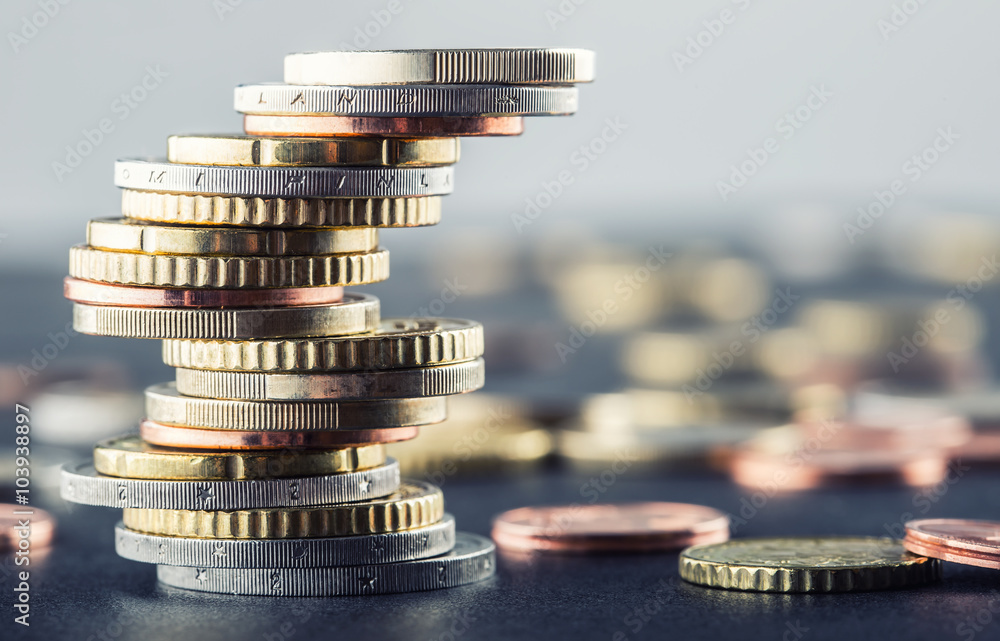 Euro coins. Euro money. Euro currency.Coins stacked on each other in different positions. Money concept.