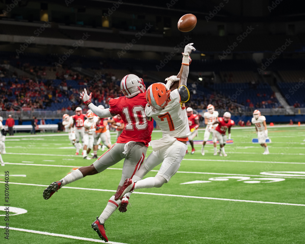 Great action photos of high school football players making amazing plays during a football game
