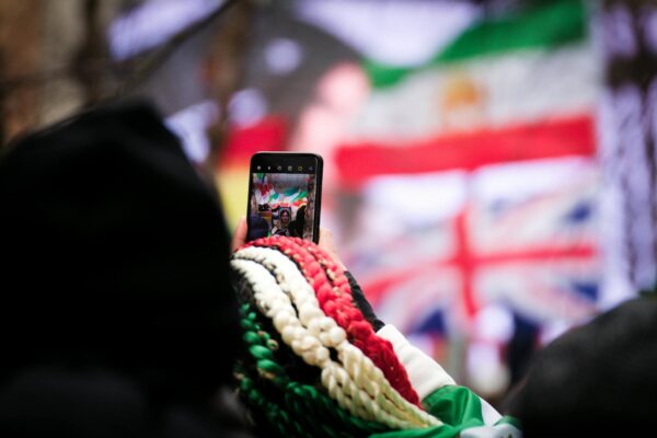 smartphone behind colorful ribbons