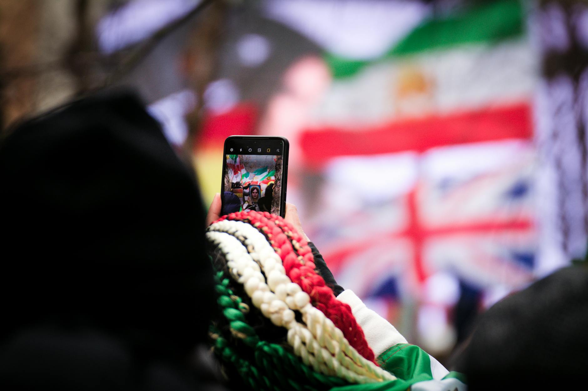 smartphone behind colorful ribbons
