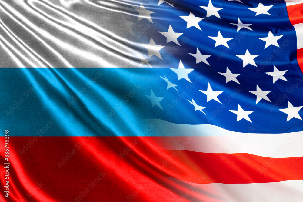 Relations between Russia and the USA. Concept - negotiations between Trump and Putin. Flags of America and Russia are nearby. International relationships. Geopolitics. United States. Russian flag